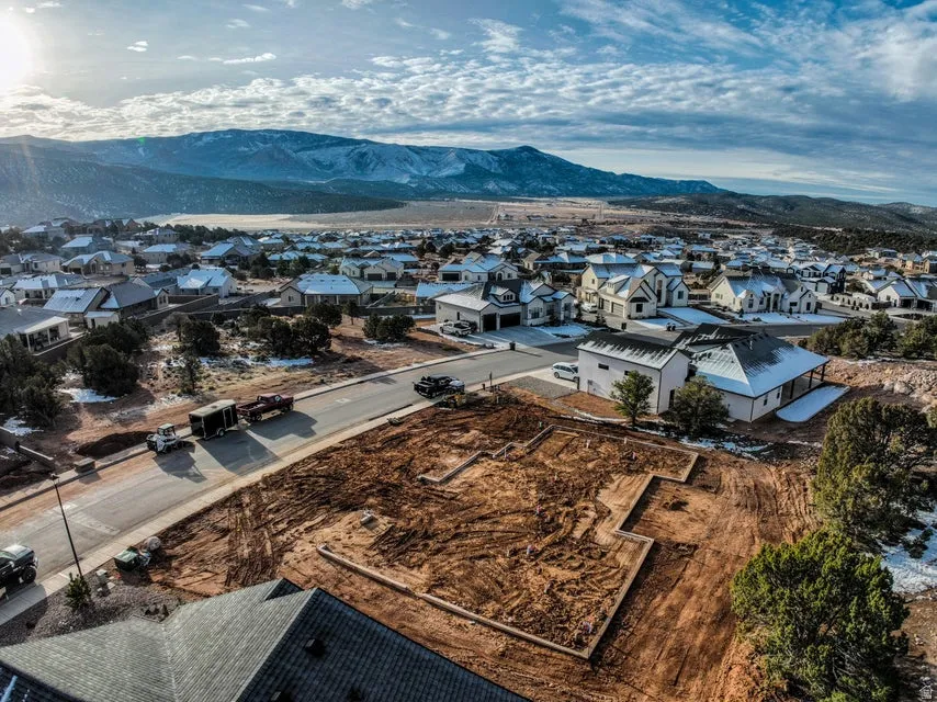 Aerial perspective of suburban area featuring mountains