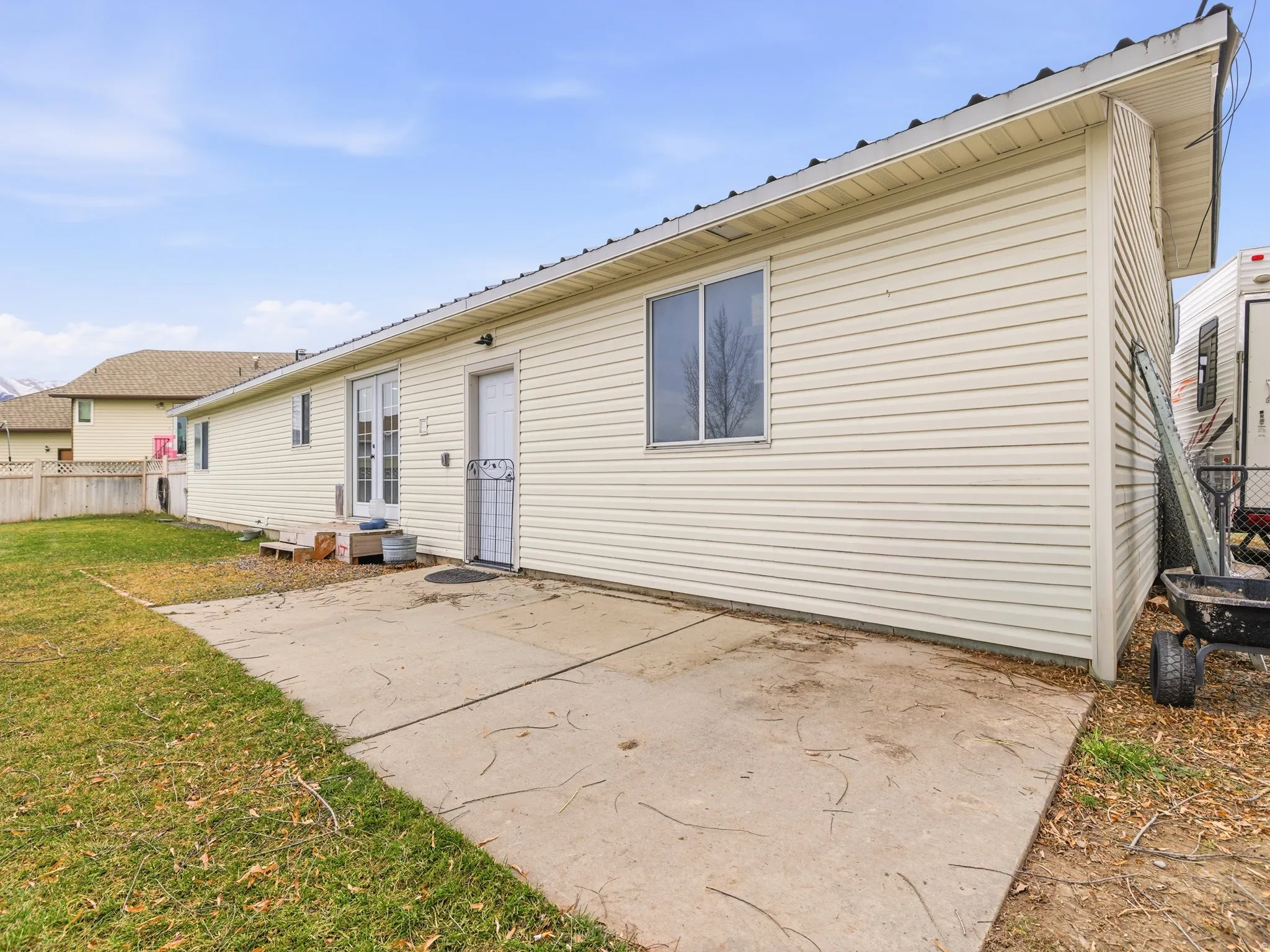 Rear view of house with a patio area