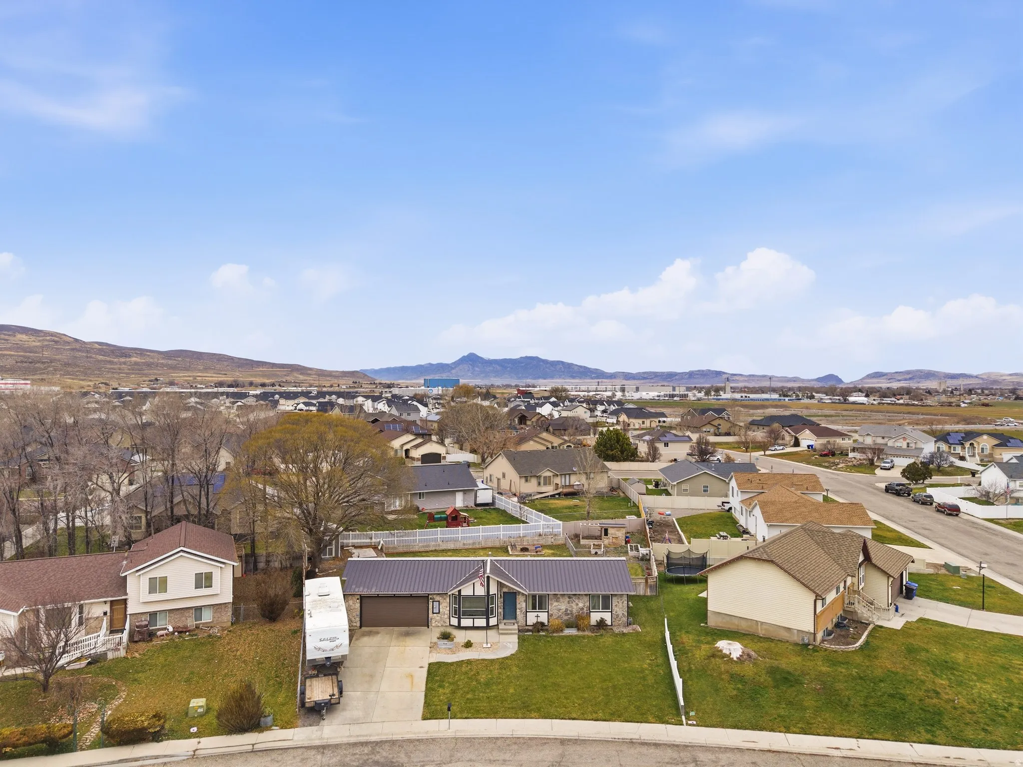 Aerial perspective of suburban area featuring mountains