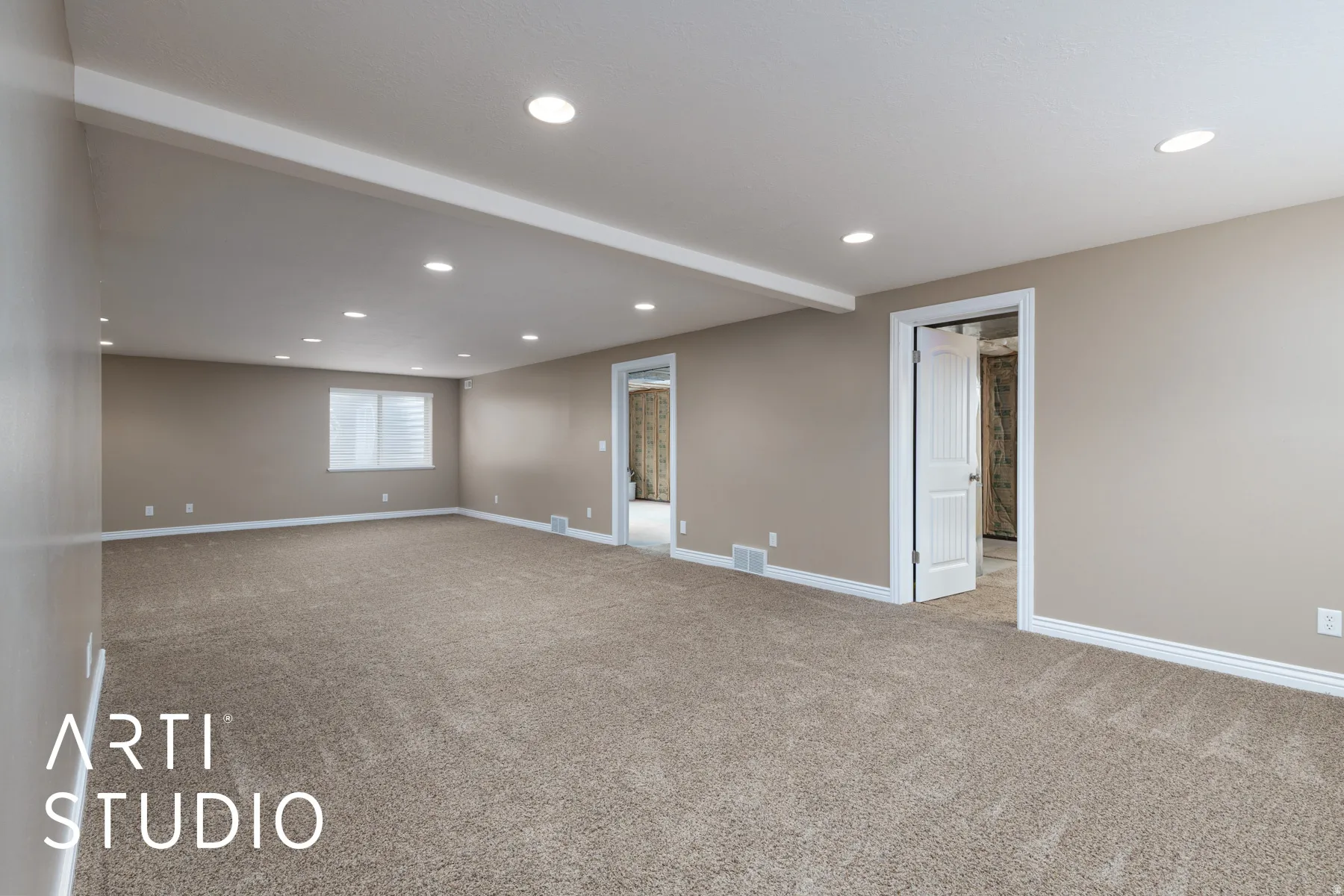 Spare room featuring recessed lighting and light colored carpet