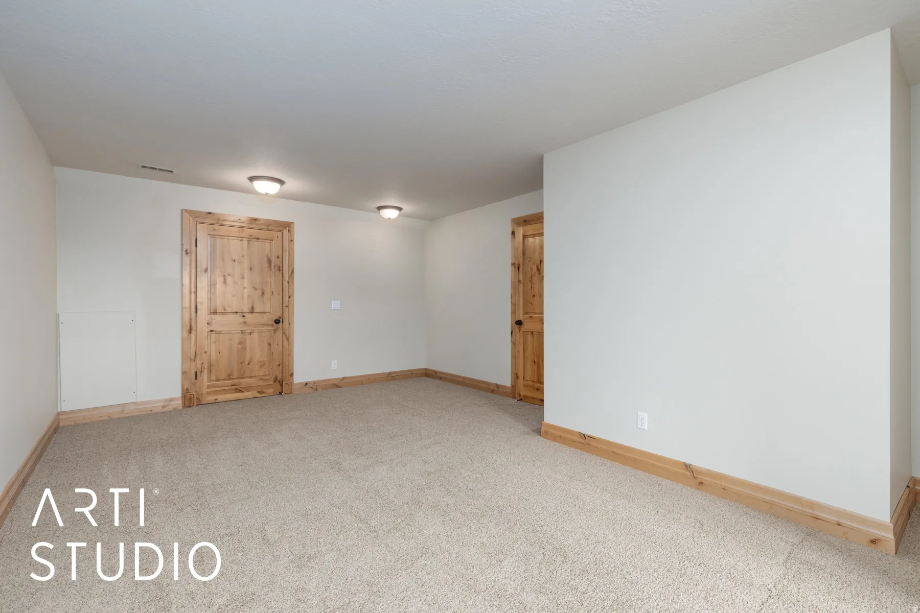 Spare room featuring carpet flooring