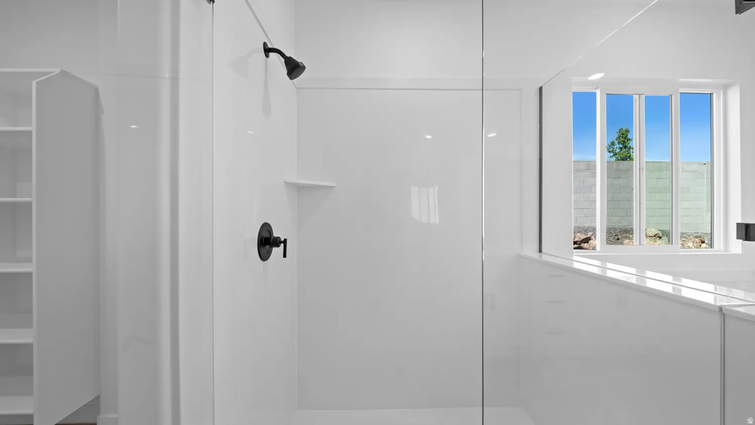 Bathroom featuring walk in shower