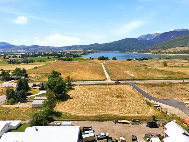 Expansive parcel featuring a mix of cultivated fields and undeveloped land