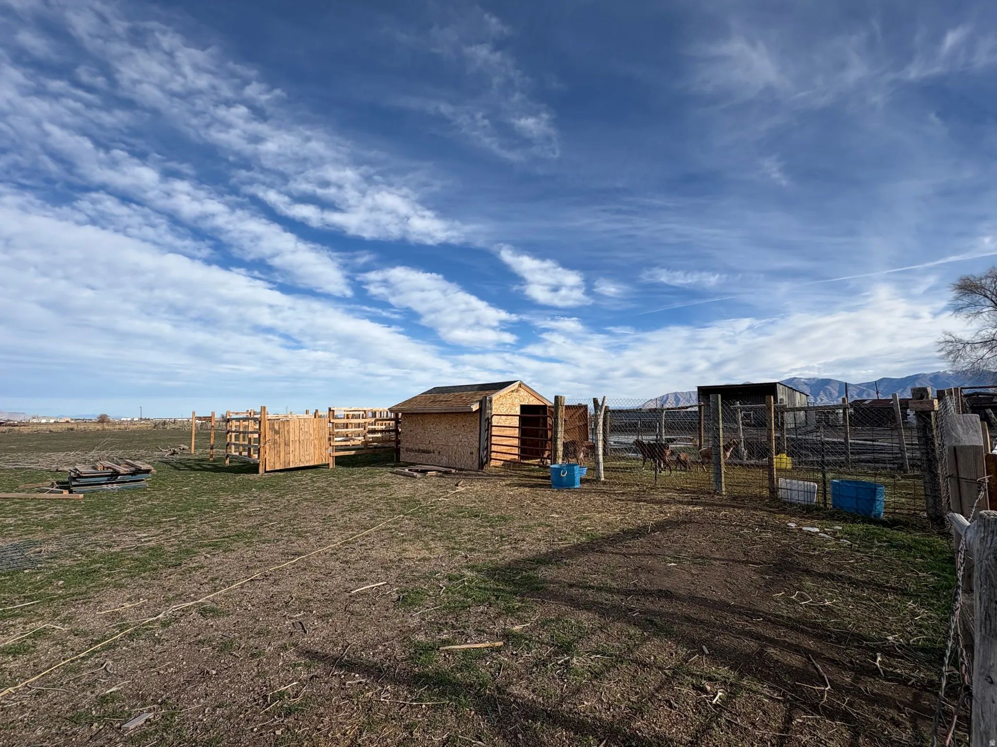 View of yard with an outdoor structure and exterior structure