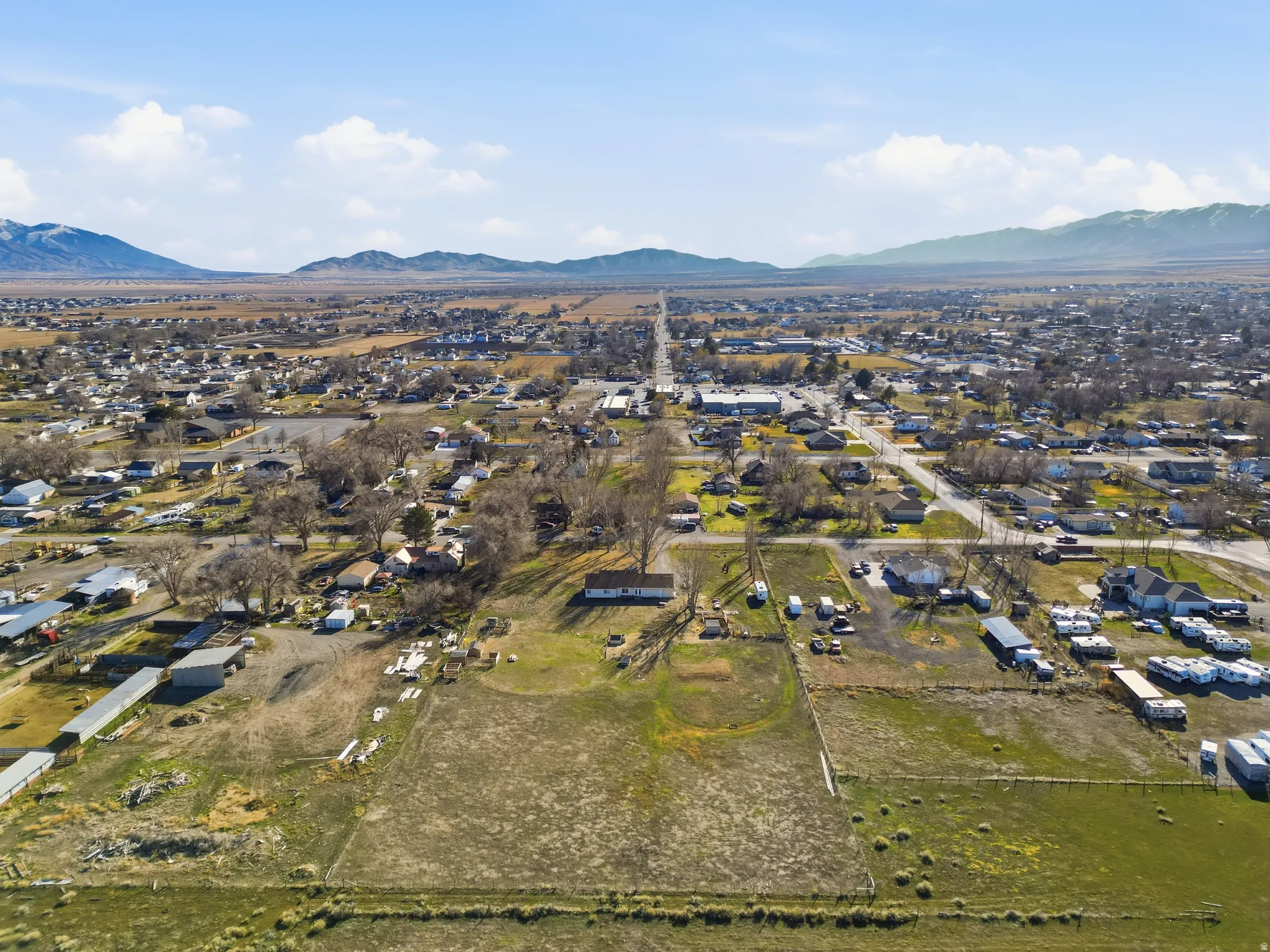 Aerial view of residential area featuring mountains