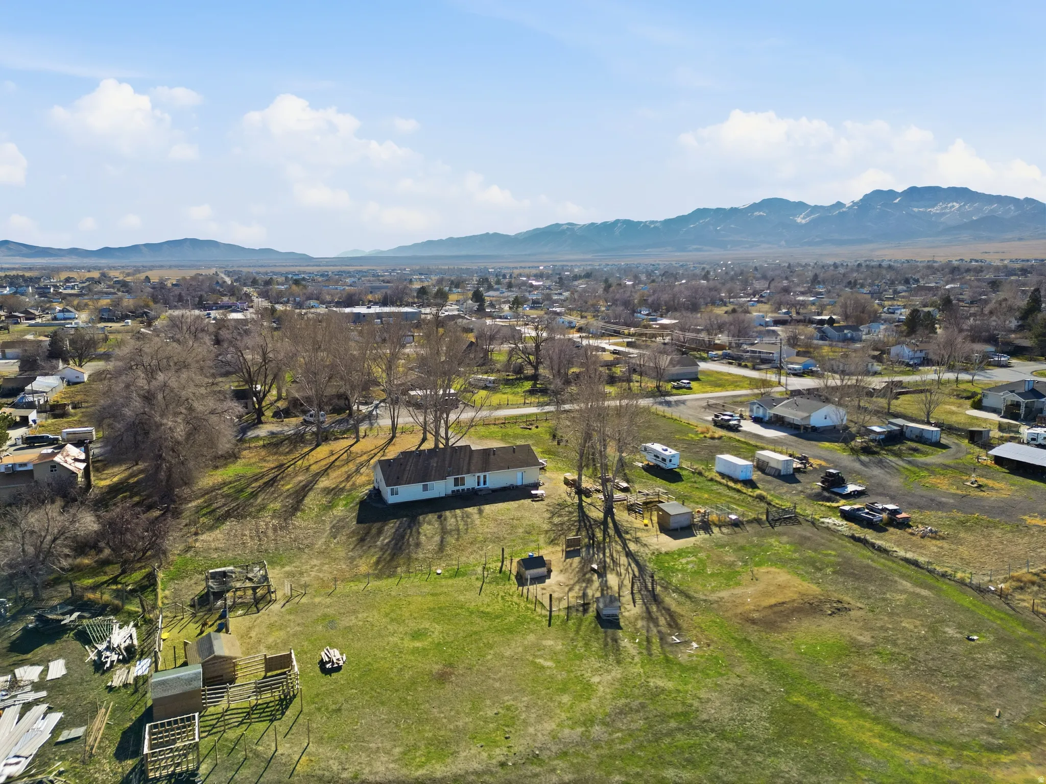 Aerial view of residential area featuring mountains