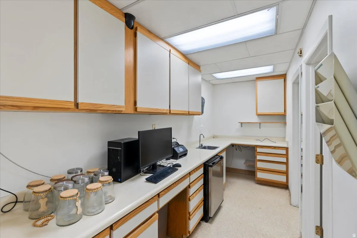 Office area with built in desk