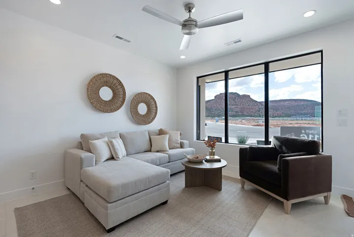 Living room featuring recessed lighting and ceiling fan