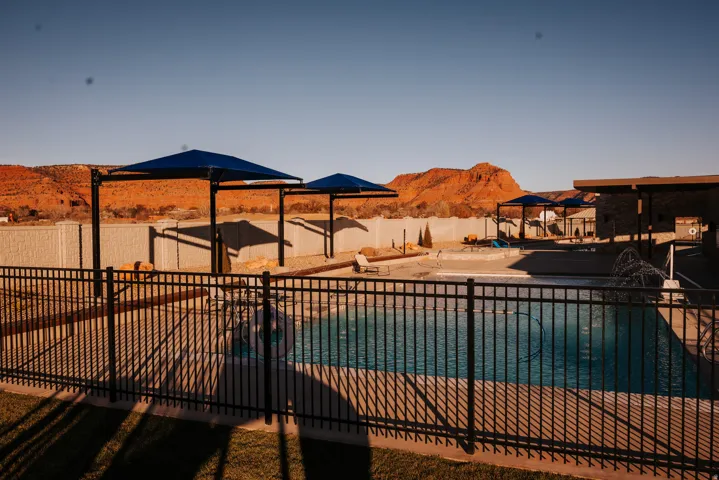 View of swimming pool featuring a patio area and a mountain view