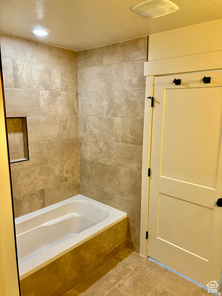 Bathroom with bathtub / shower combination