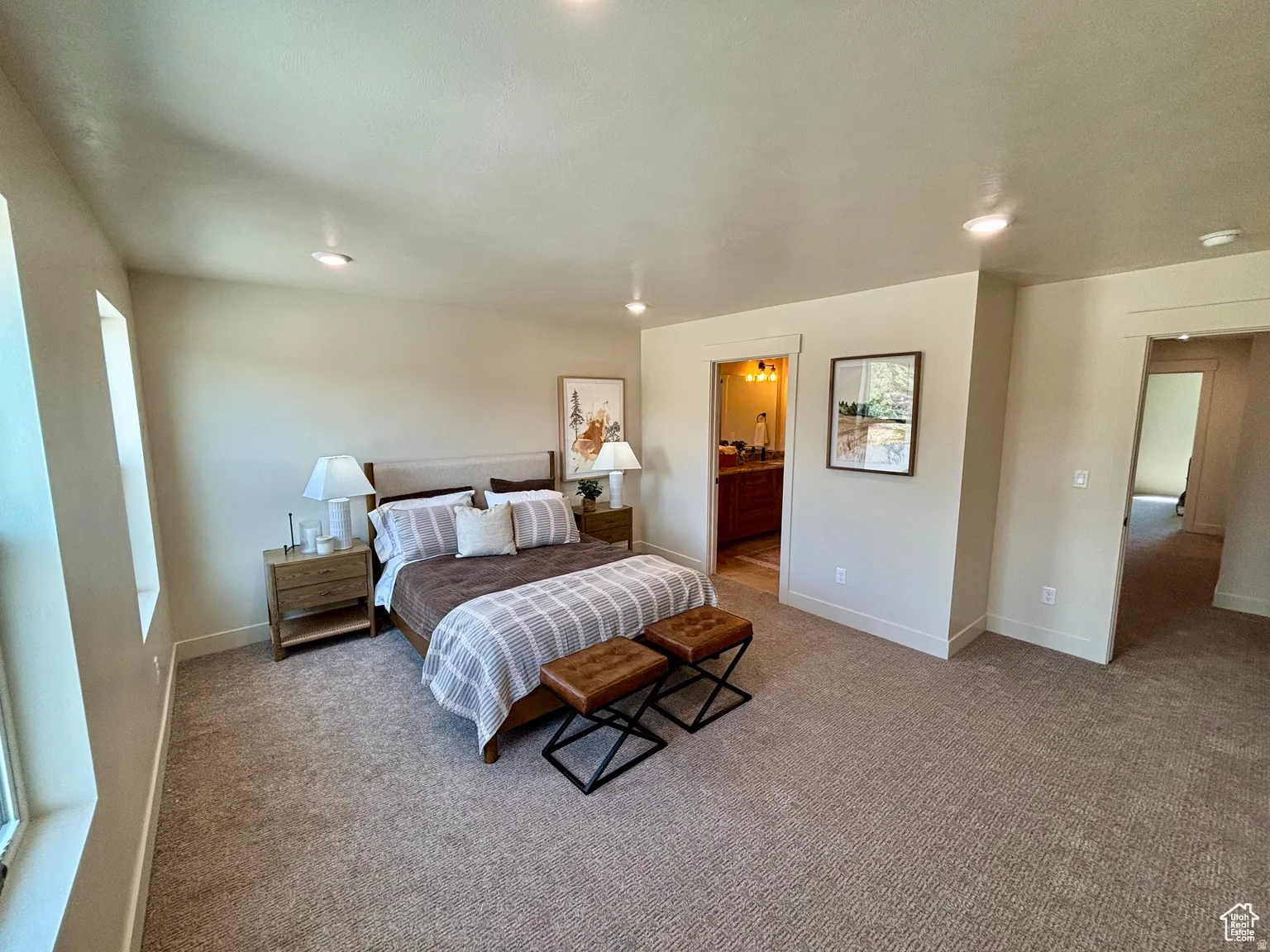 Carpeted bedroom featuring recessed lighting and ensuite bathroom