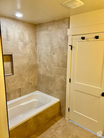 Bathroom with bathtub / shower combination
