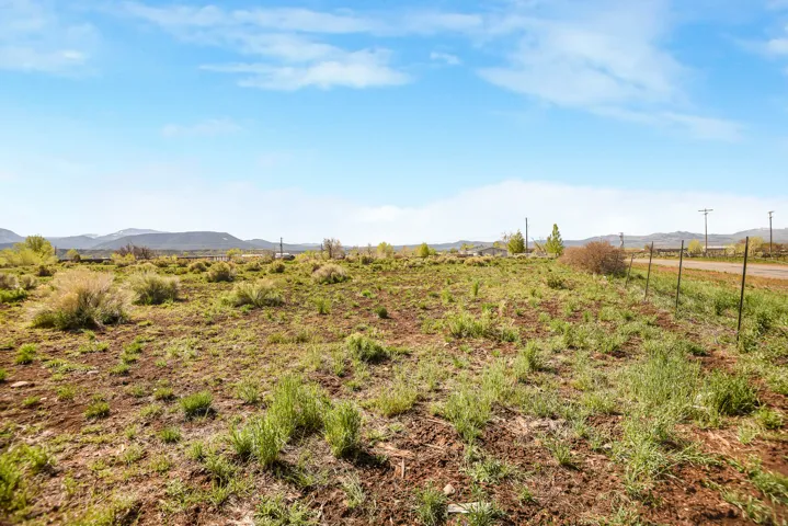 View of yard featuring a mountain view and a rural view