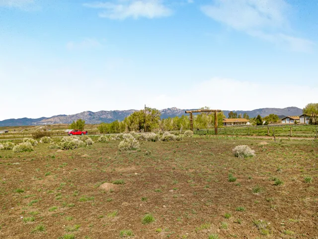 View of yard with a view of countryside and a mountain view