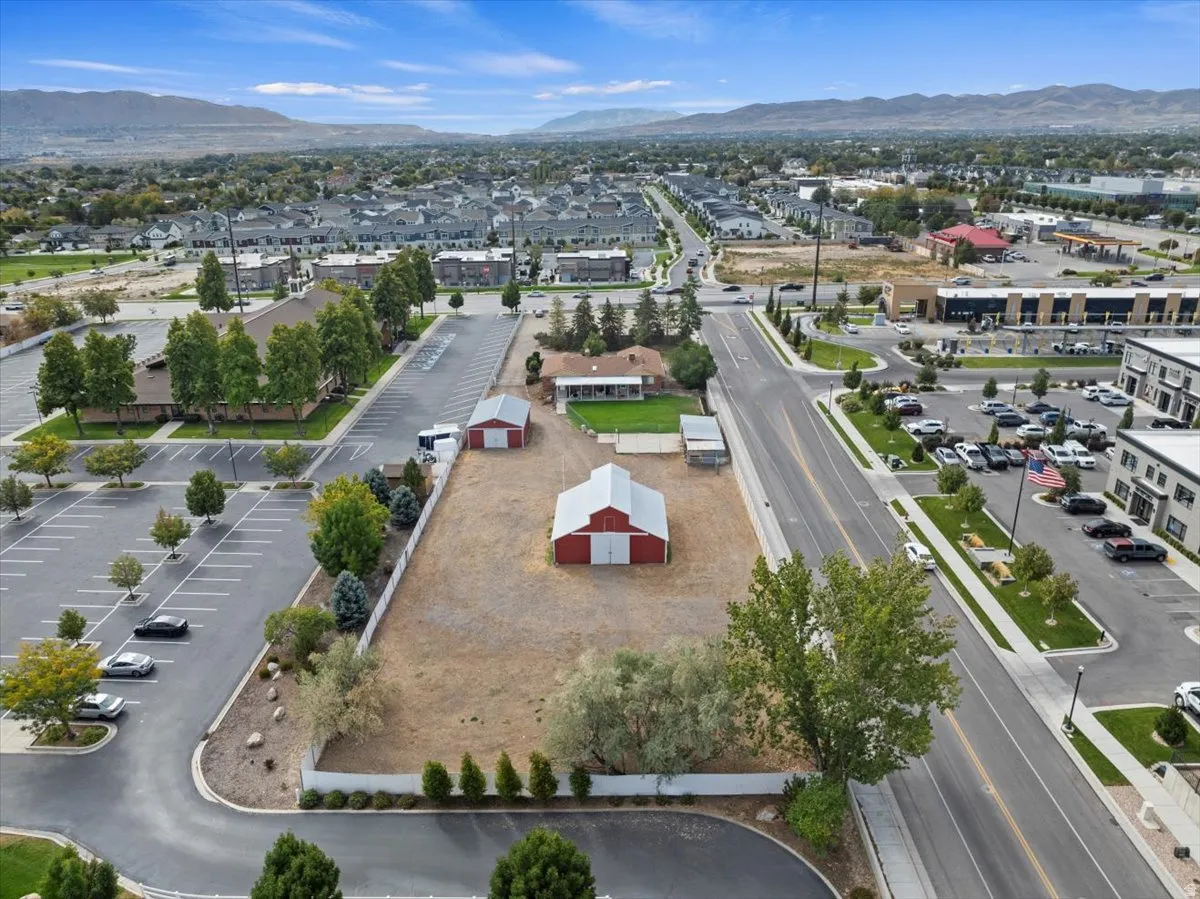 Aerial view of residential area with a mountain backdrop