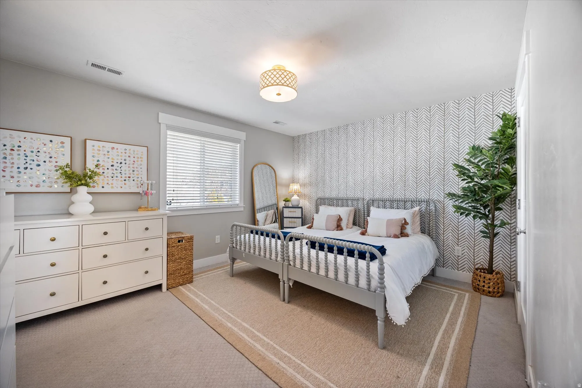 bedroom #2 featuring a walk in closet and access to the jack-and-jill bathroom