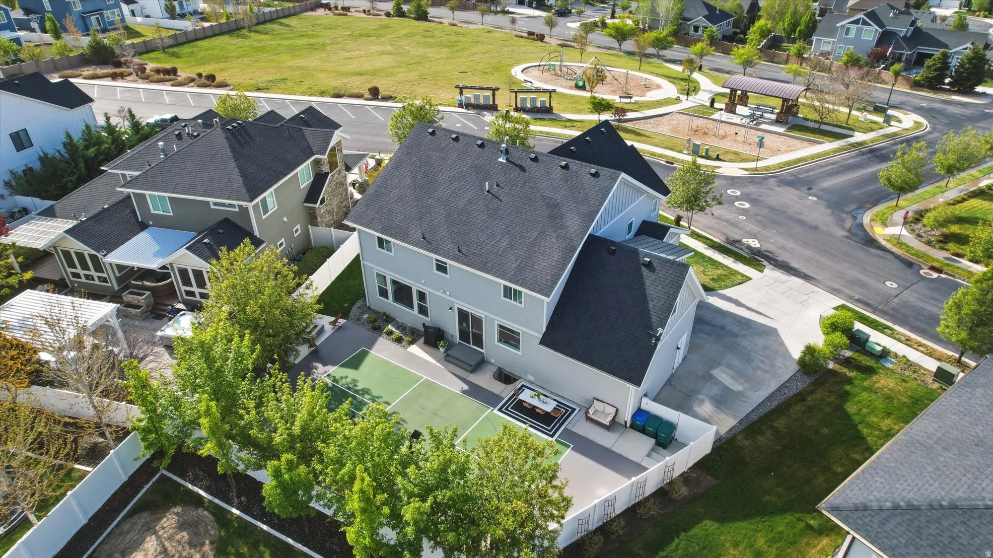 Enjoy your own personal pickleball court in the backyard and huge field/playground in the front yard!