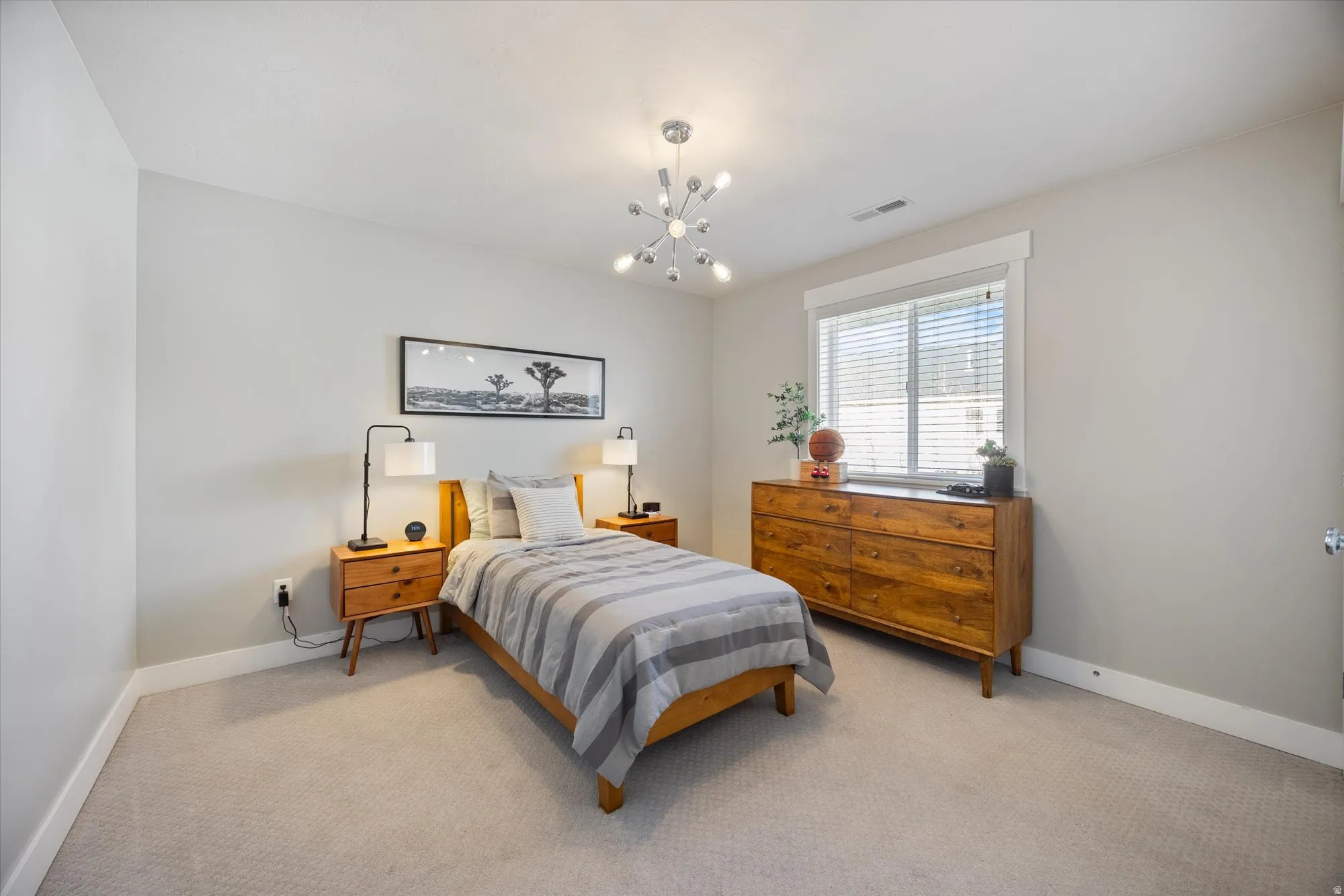 bedroom #3 with great natural light and views to the backyard