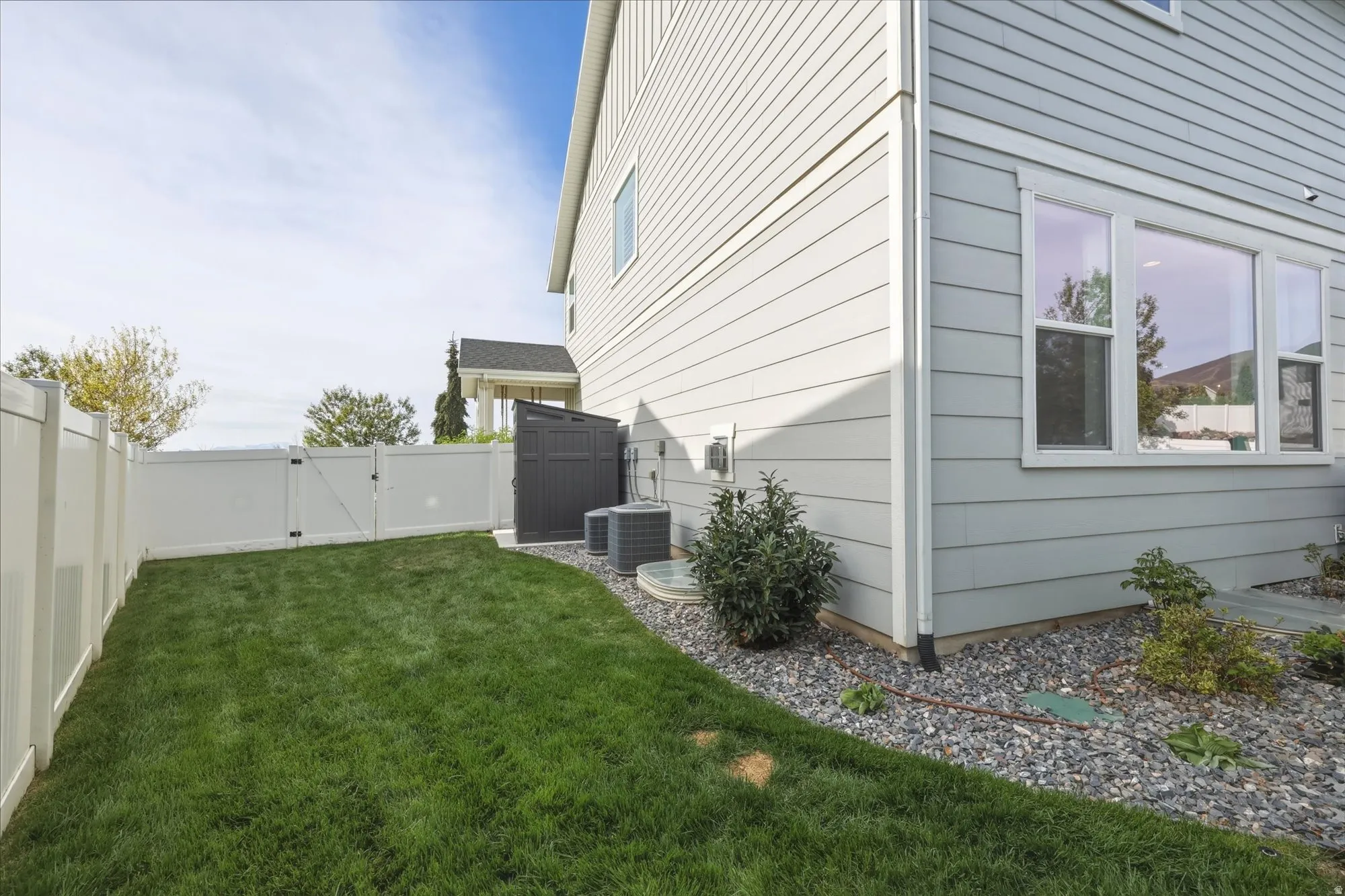 Great grassy area with room for a garden, playset or in-ground trampoline!
