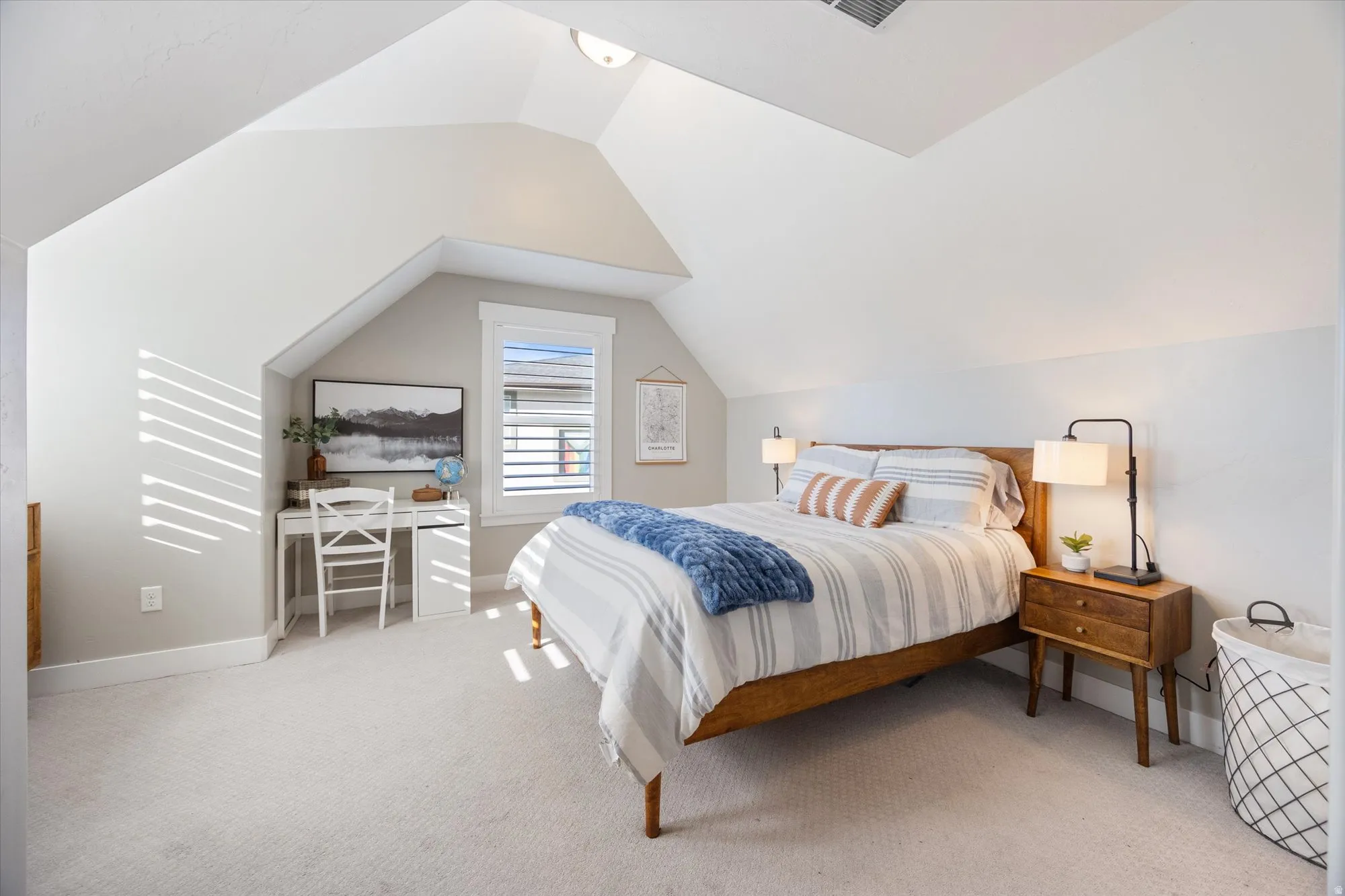 Spacious bedroom #4 has vaulted ceilings and lots of natural light