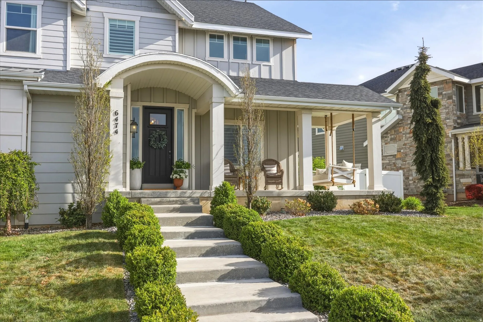 Enjoy the beautiful covered wrap-around front porch with porch swing