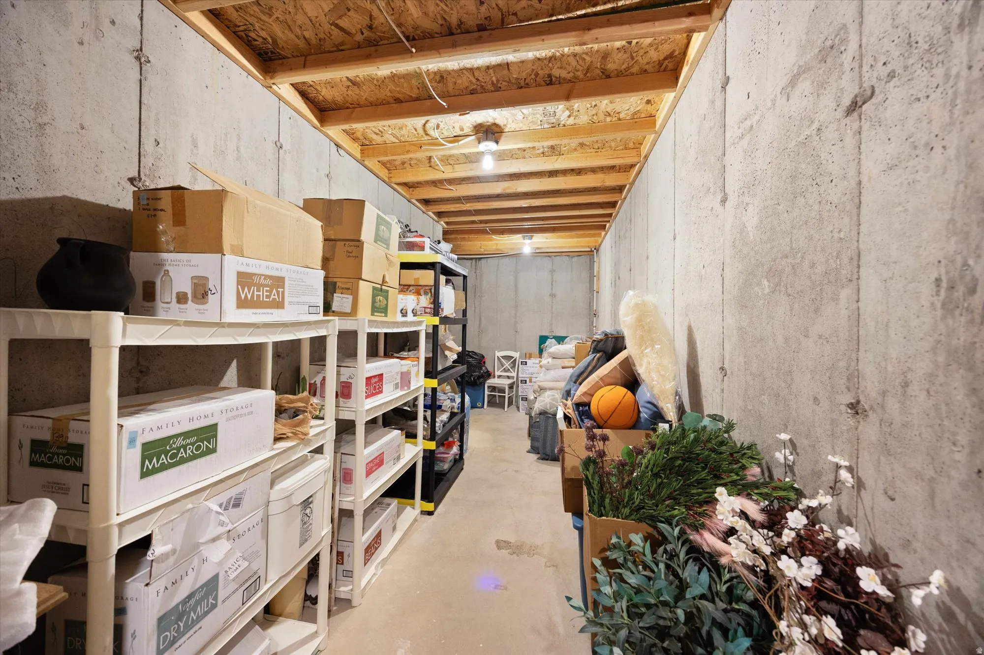 Large storage room with built in shelving