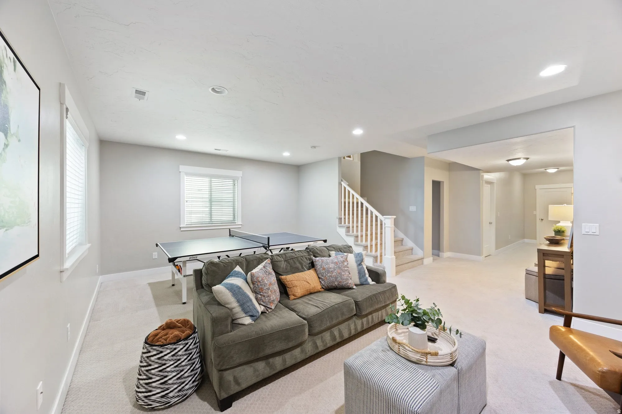 Down stairs rec room with access to the extra play space under the stairs