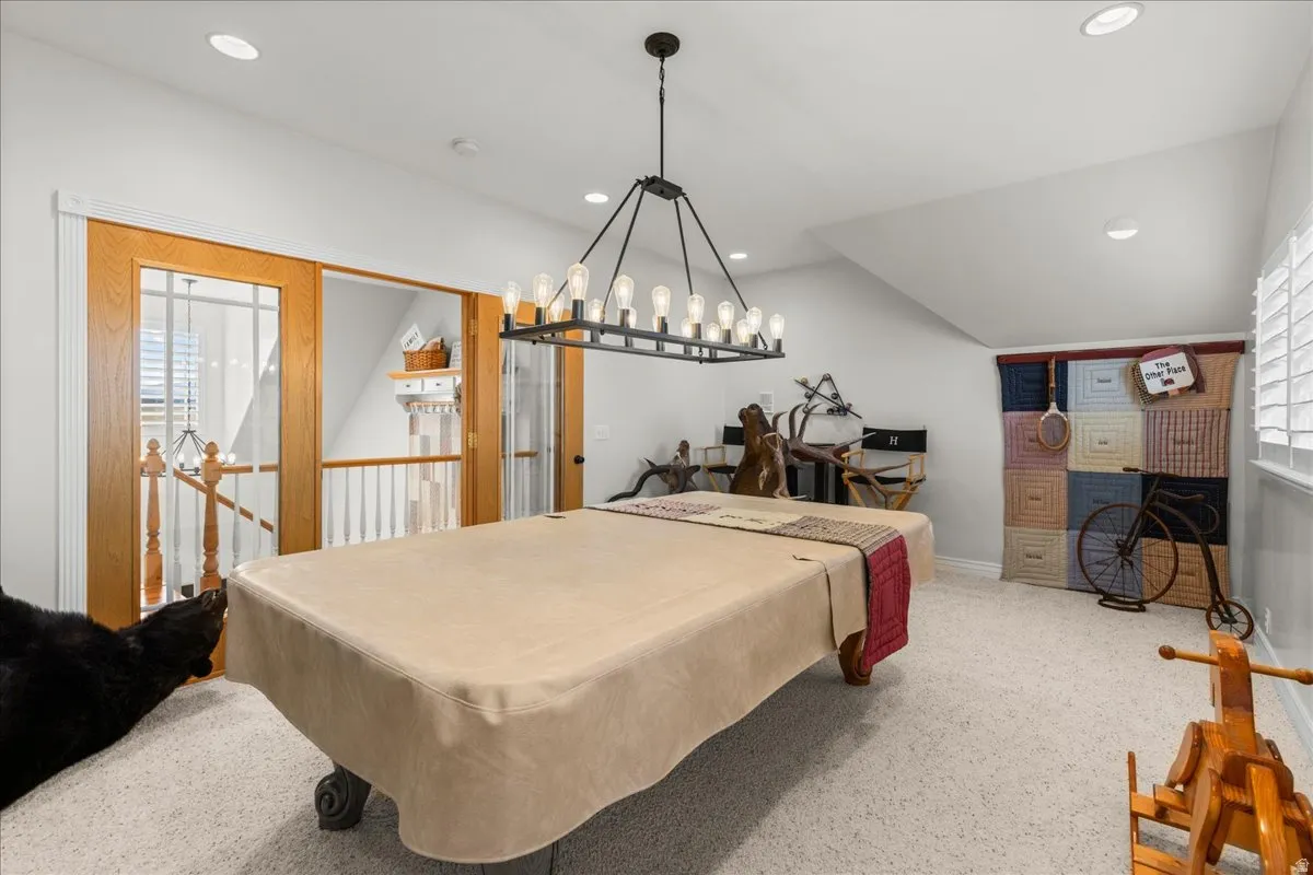 Game room with recessed lighting, carpet floors, and lofted ceiling