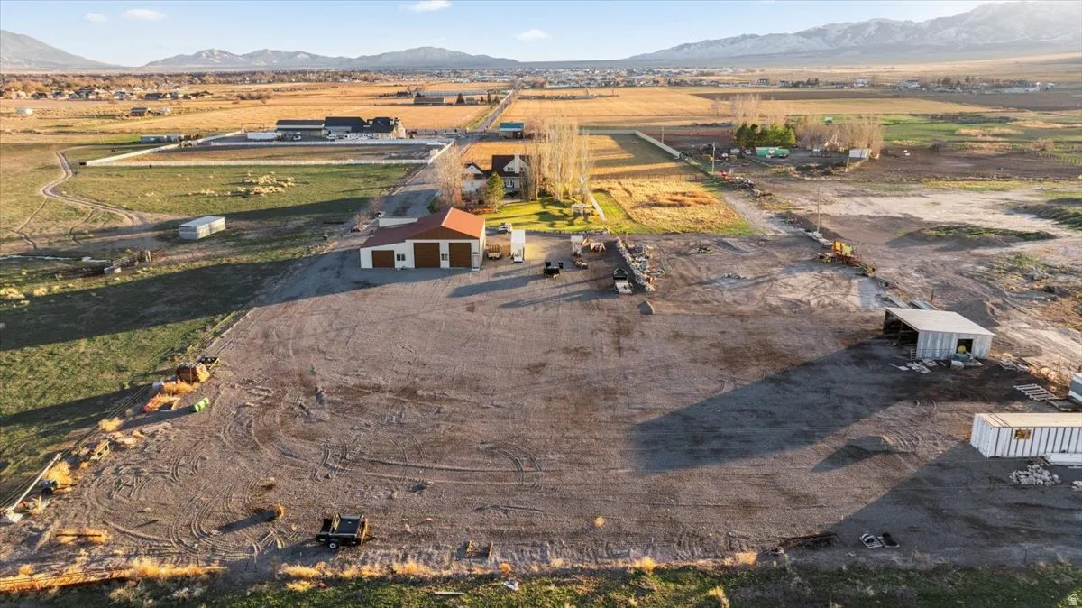 View of property location featuring a mountainous background and rural landscape