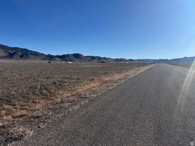 View of asphalt road with a mountain view