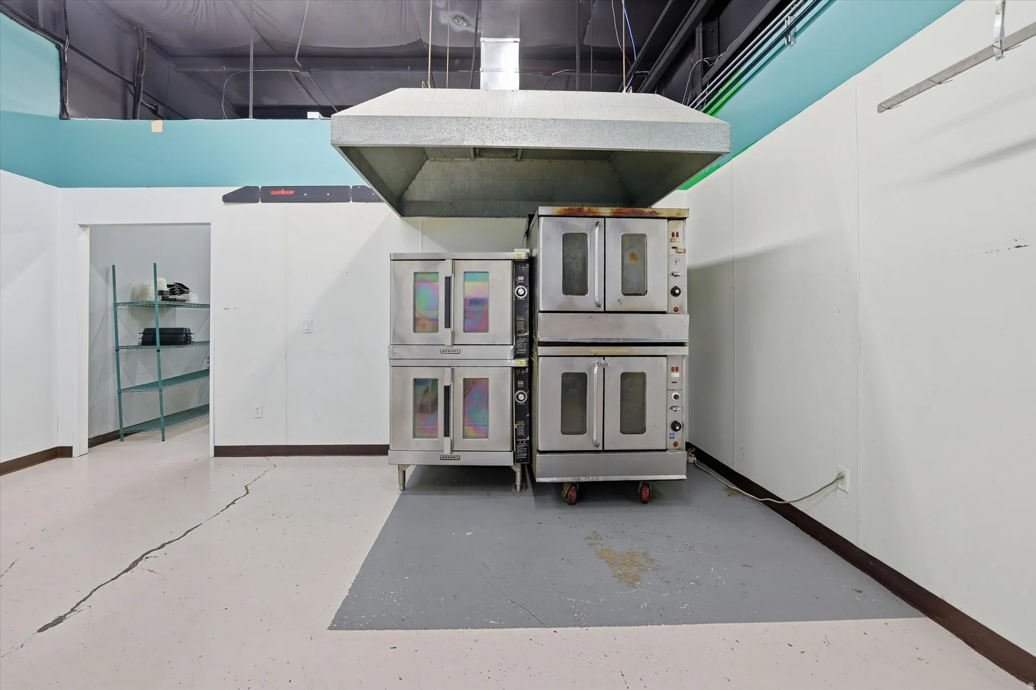 Kitchen featuring a towering ceiling