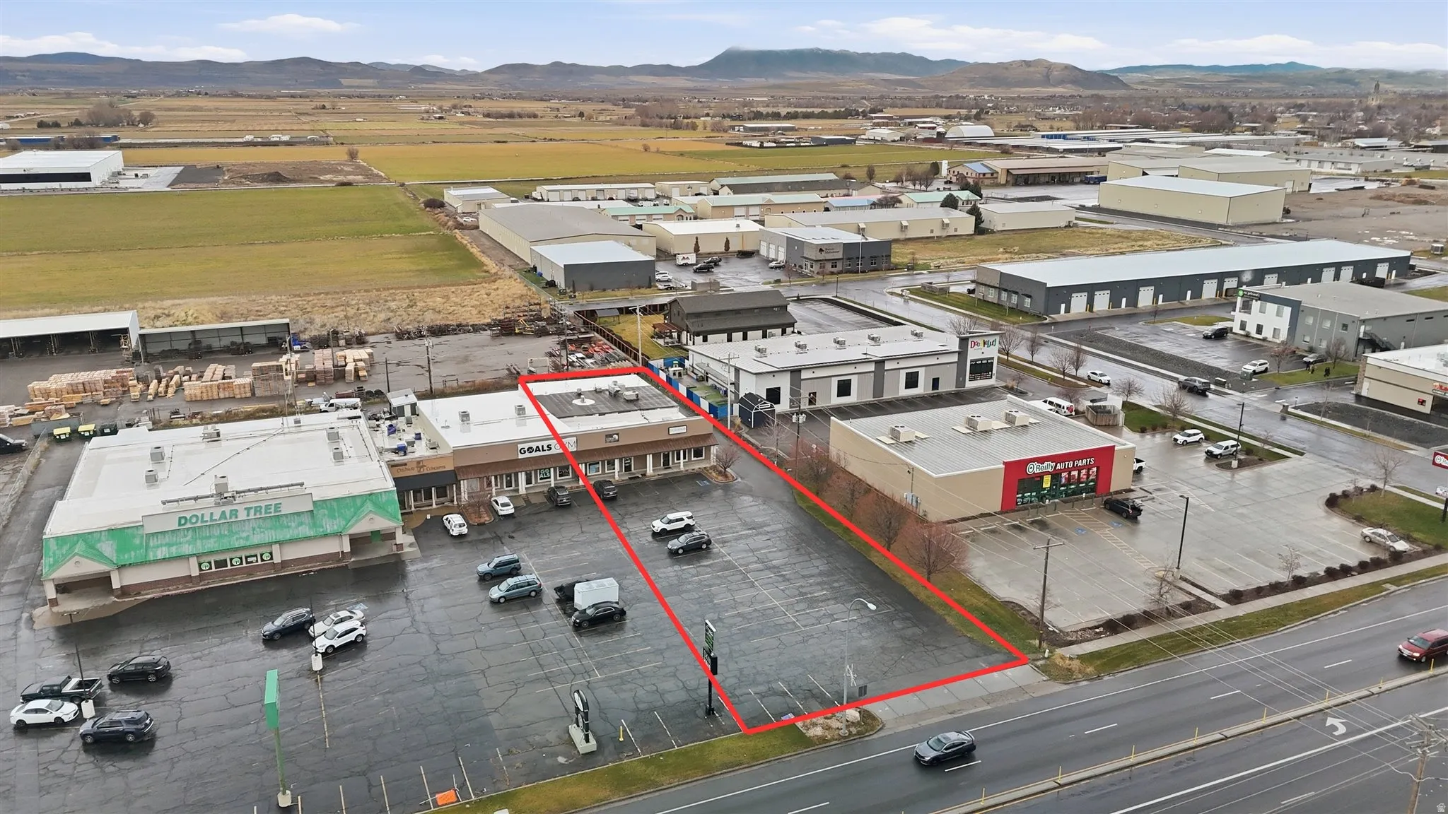 Aerial overview of property's location featuring property parcel outlined