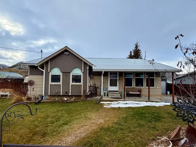 View of front of home with a metal roof