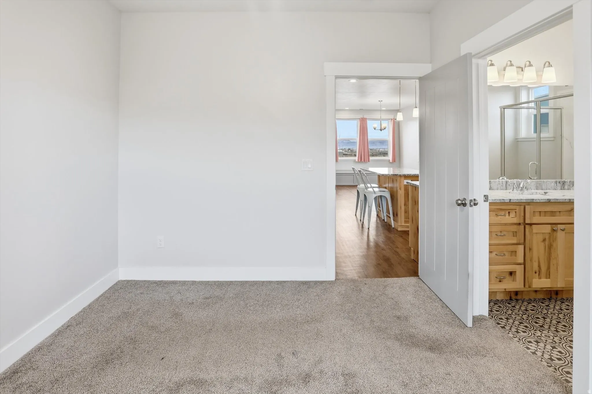 ADU primary bedroom with ensuite bathroom