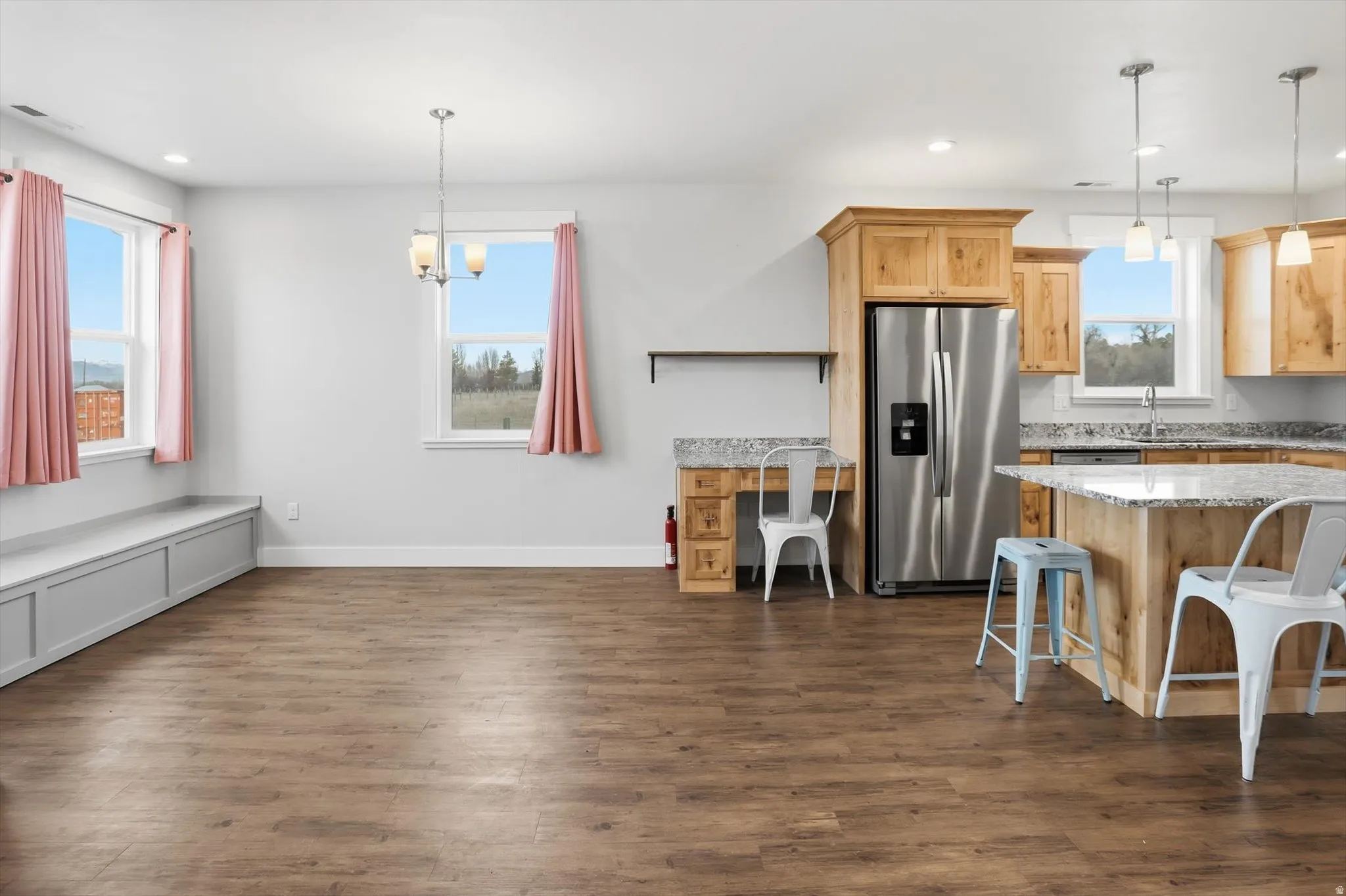 All main floor living ADU adjacent, yet separate from the main house only sharing via the garage