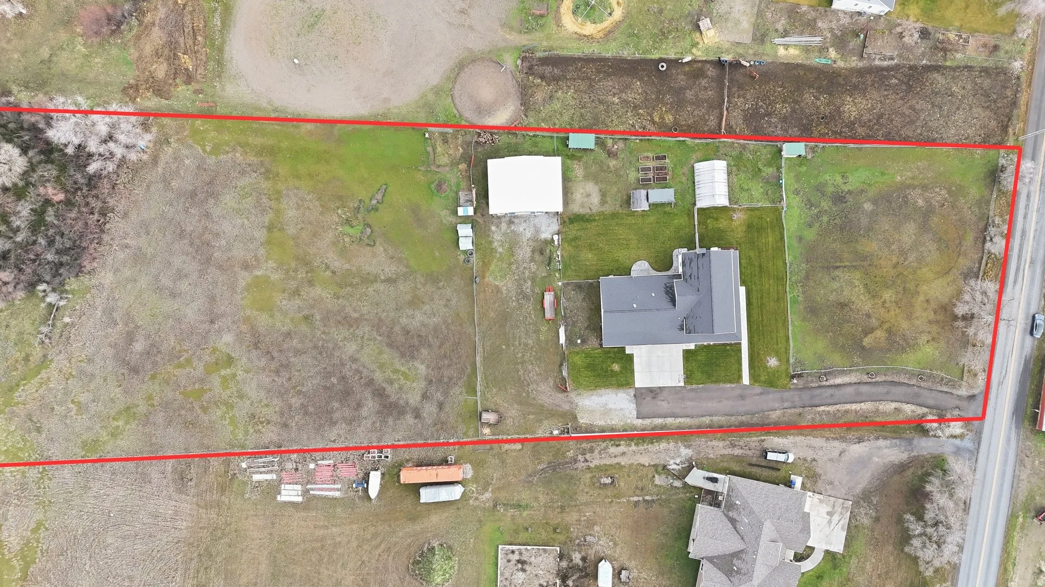 Aerial overview of property's location featuring property boundaries highlighted