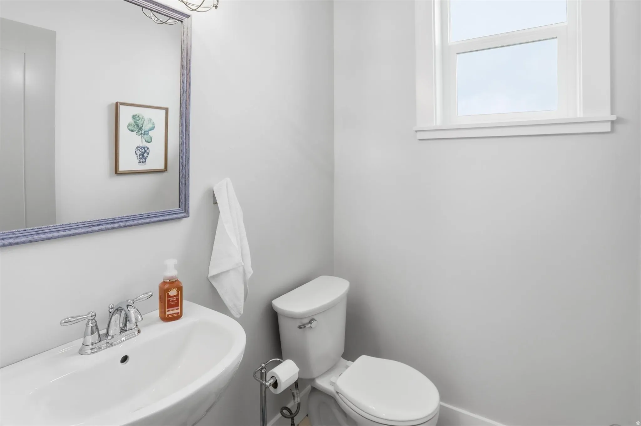 Bathroom with a sink and toilet