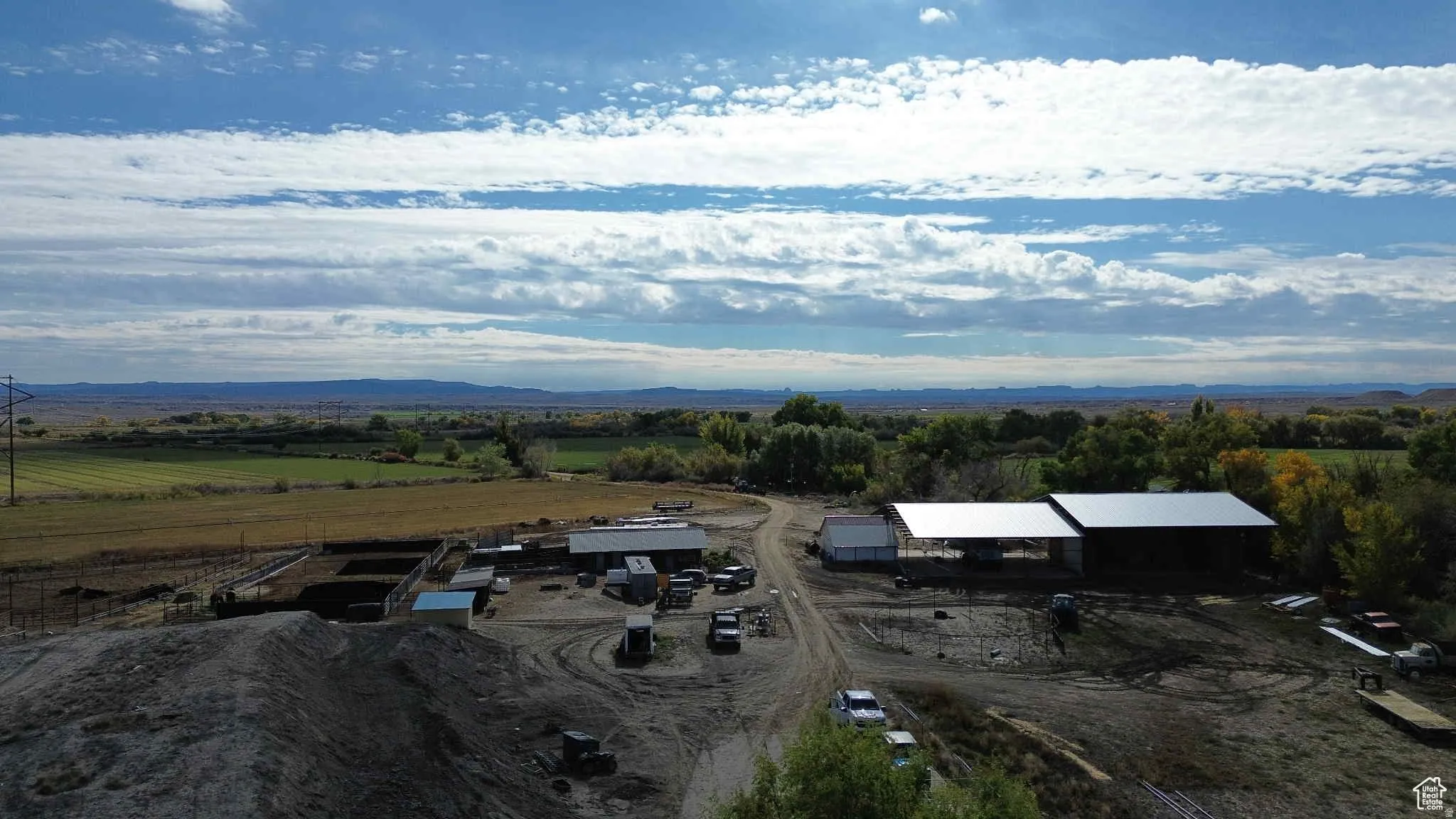 Aerial view of sparsely populated area with a mountain backdrop