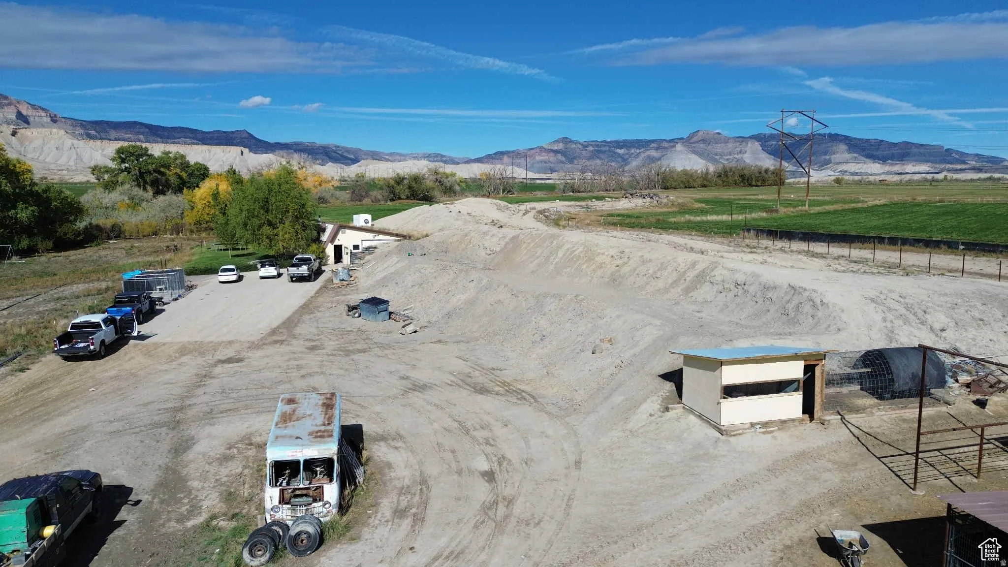 Aerial view of sparsely populated area with a mountain backdrop
