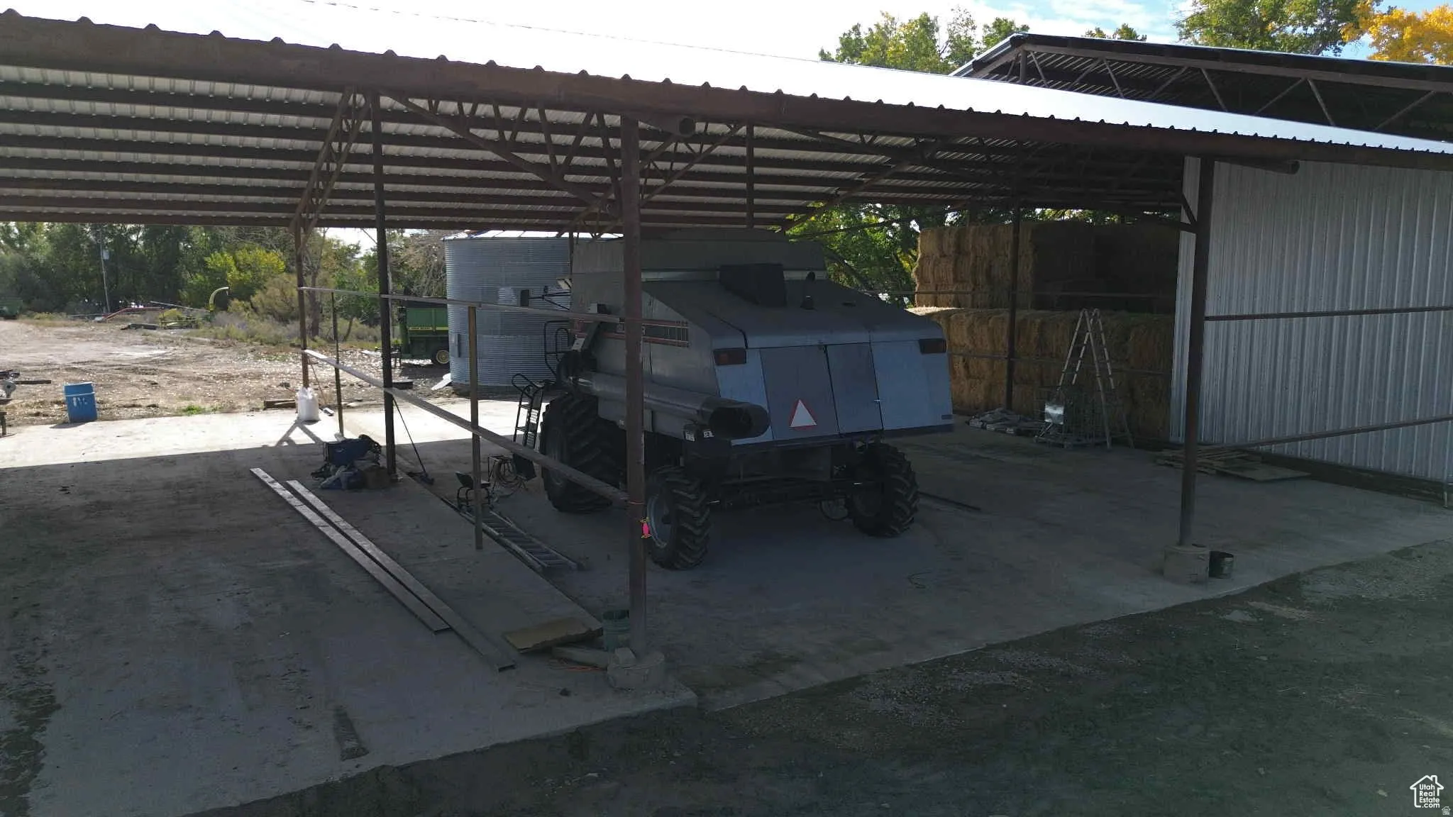 View of vehicle parking with a carport