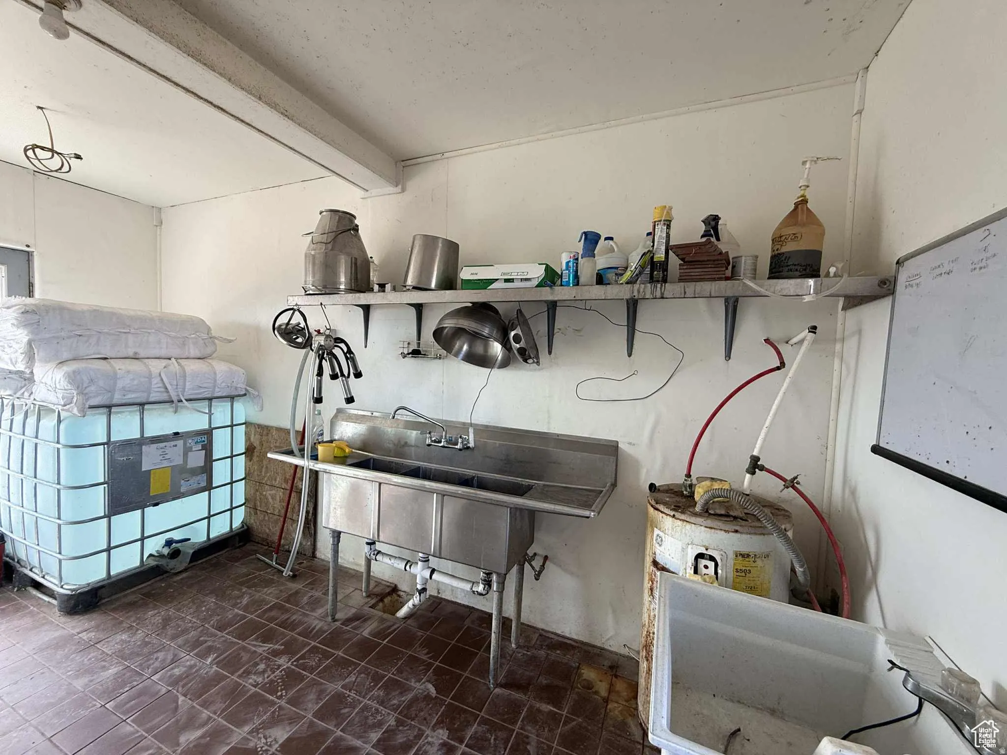 Miscellaneous room with a sink