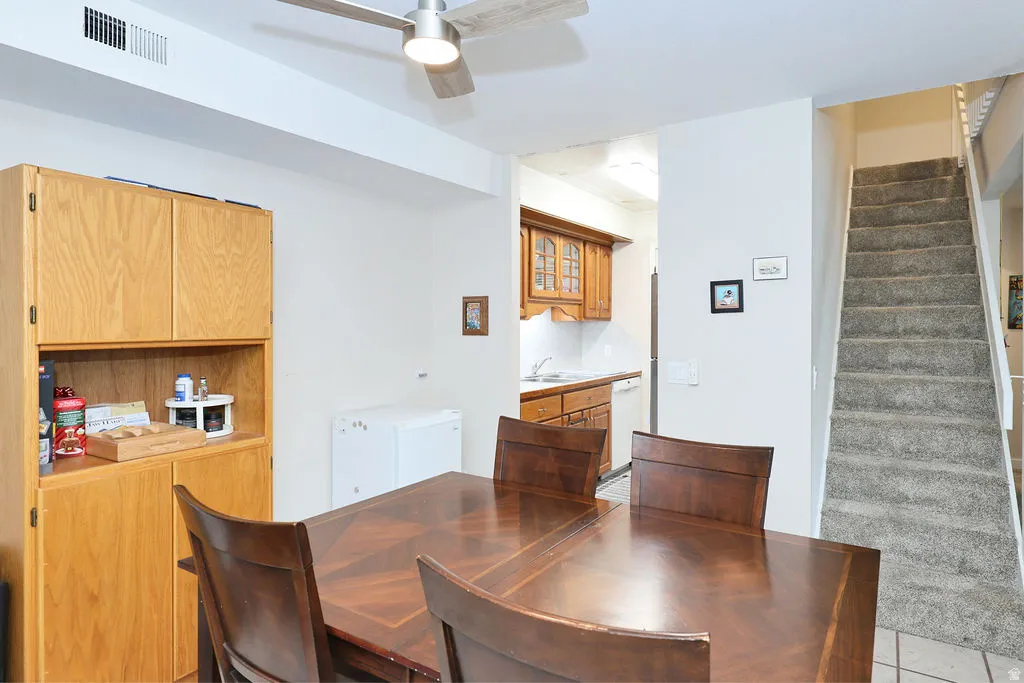 Dining room showing stairs to loft.