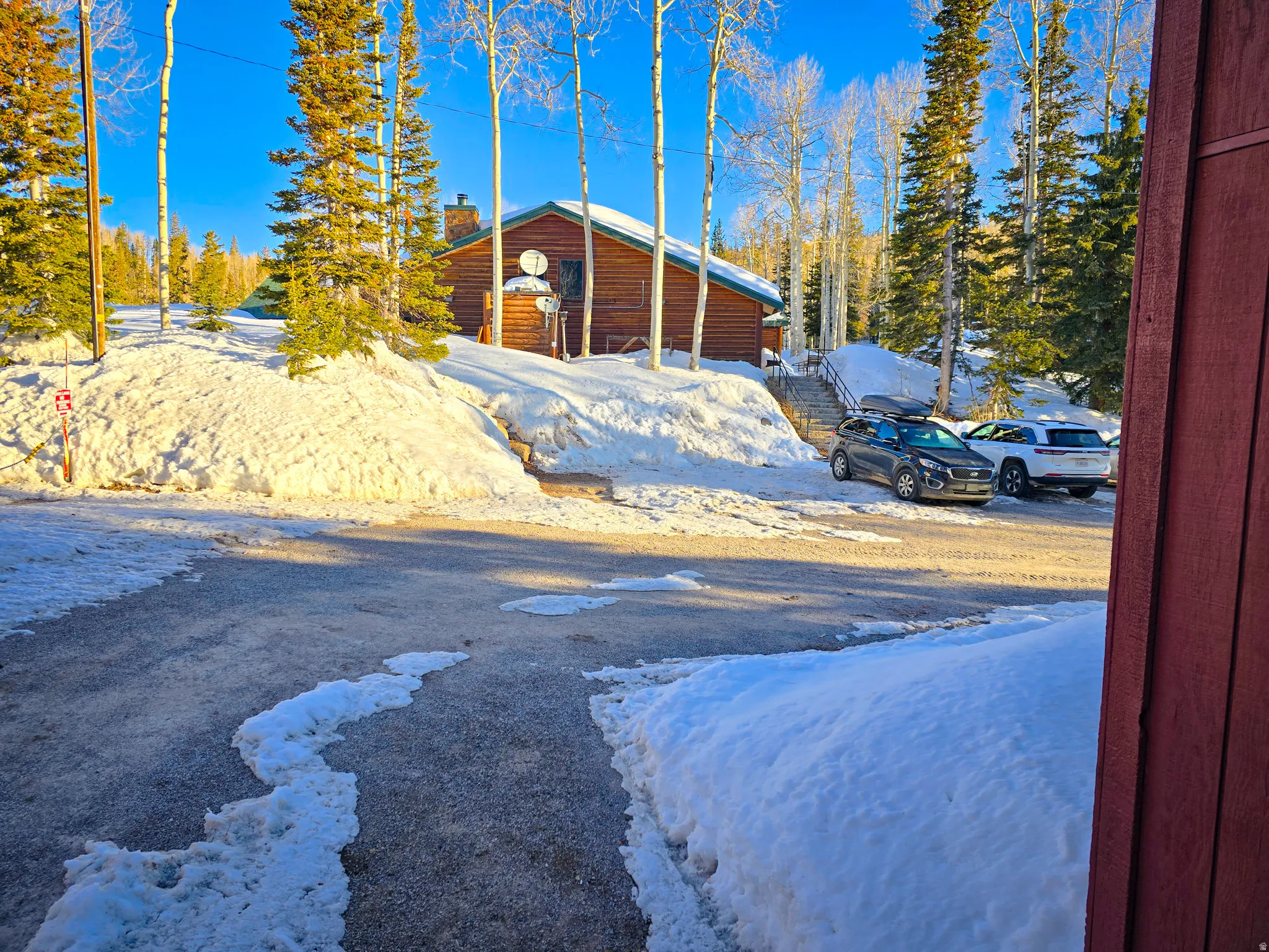 View of yard covered in snow