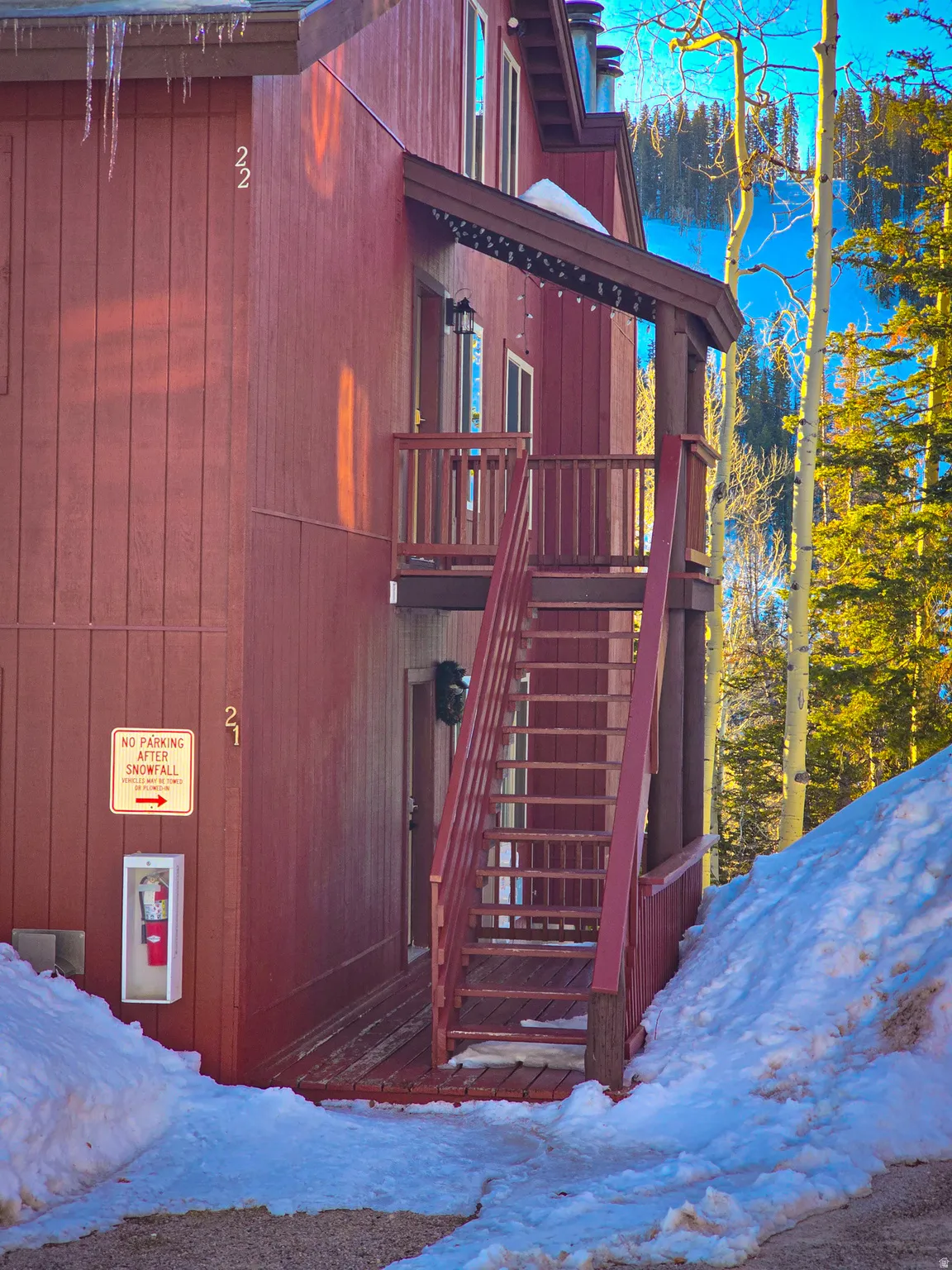 Snow covered playground featuring stairs