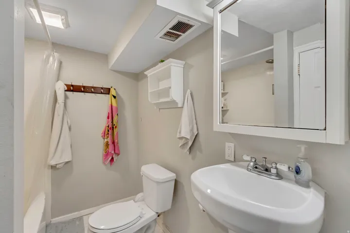 Bathroom featuring a sink and toilet