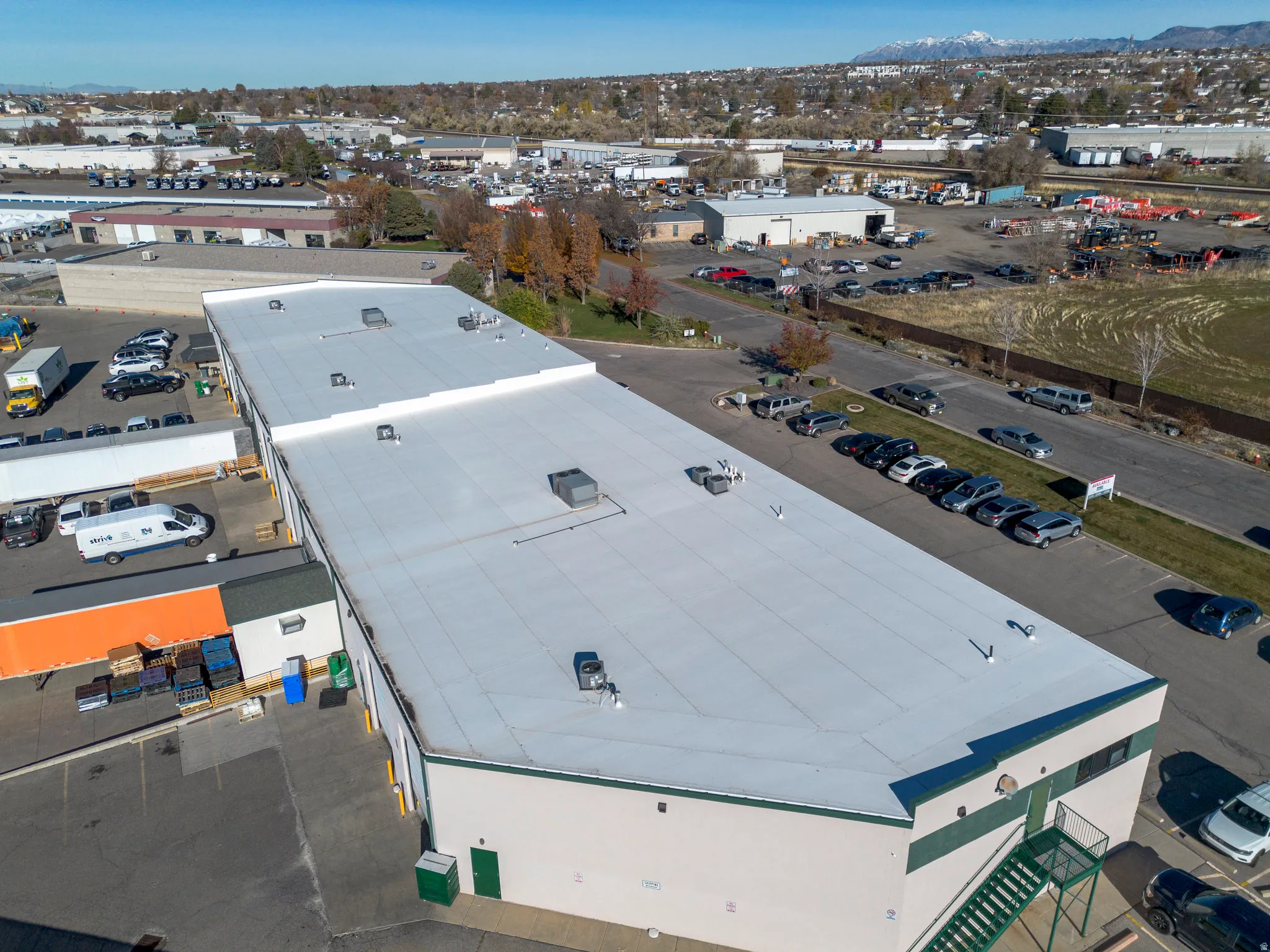 Aerial view of an industrial area and mountains