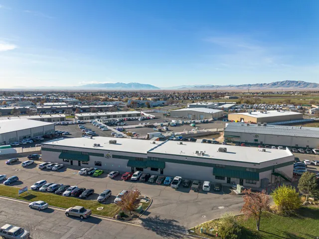 Bird's eye view of an industrial area and a mountain backdrop