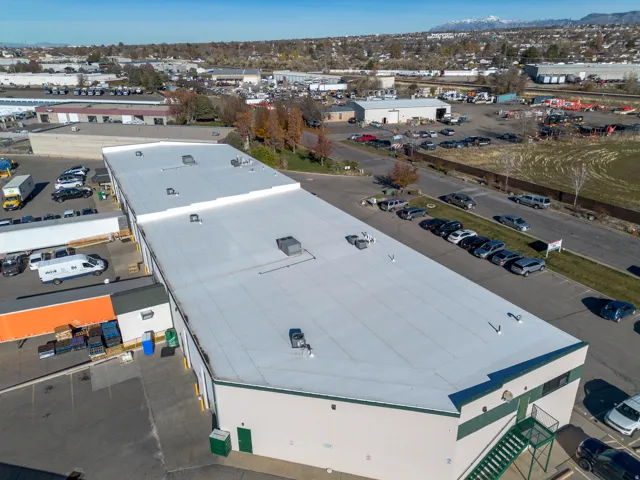 Aerial view of an industrial area and mountains