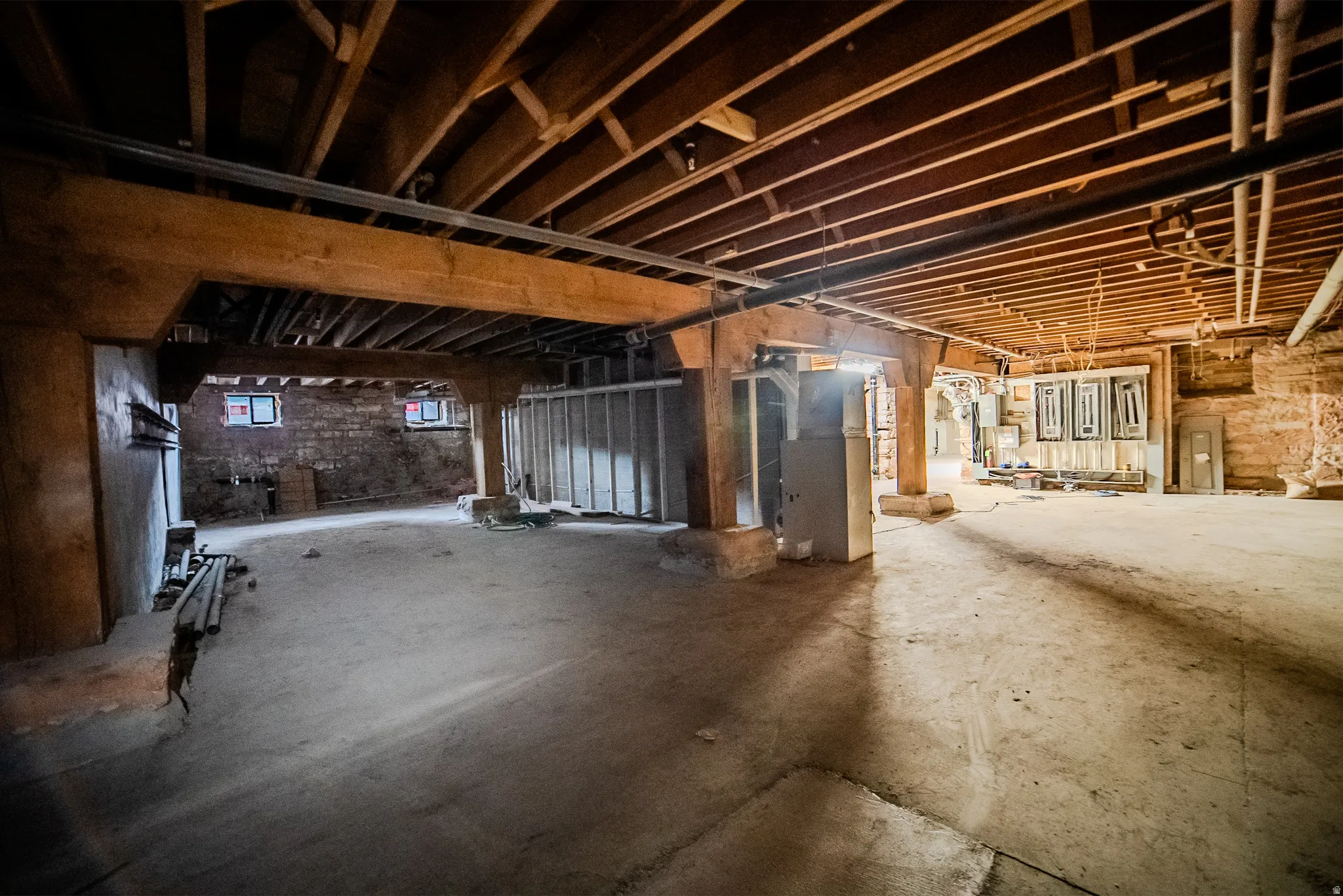 Basement featuring heating unit