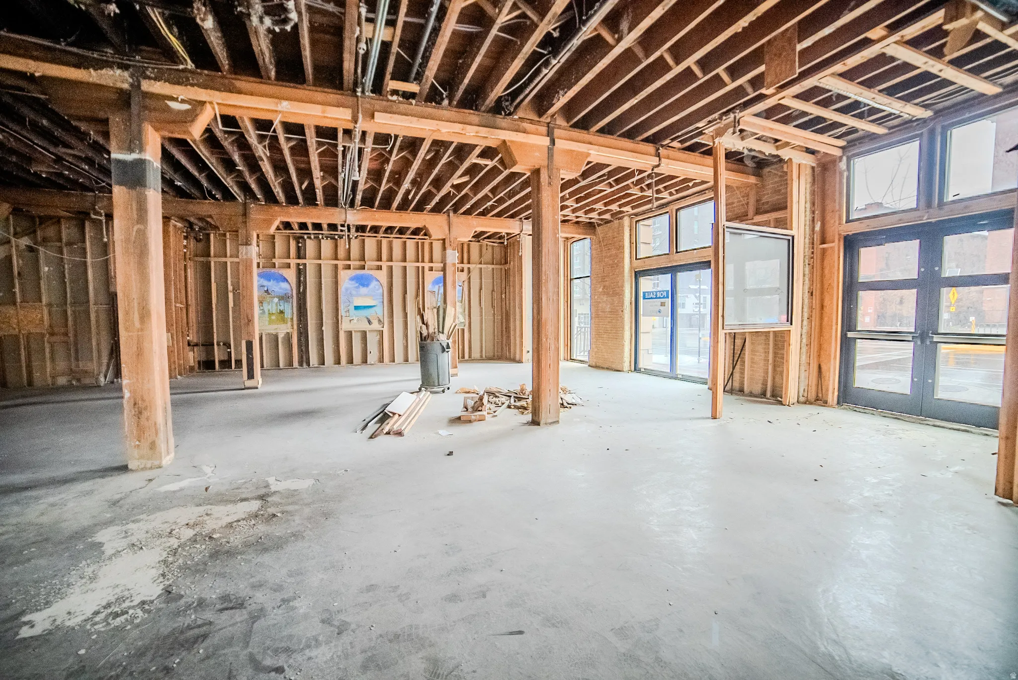 Misc room featuring unfinished concrete floors